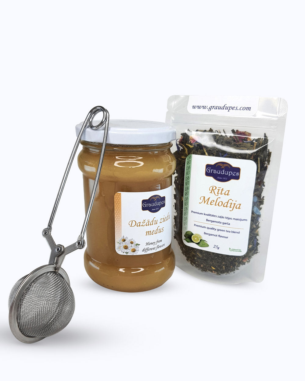 The "Tea Gift Set with Honey" includes a 25g tea blend, a metal tea mesh strainer, and a 400g jar of honey - Graudupes