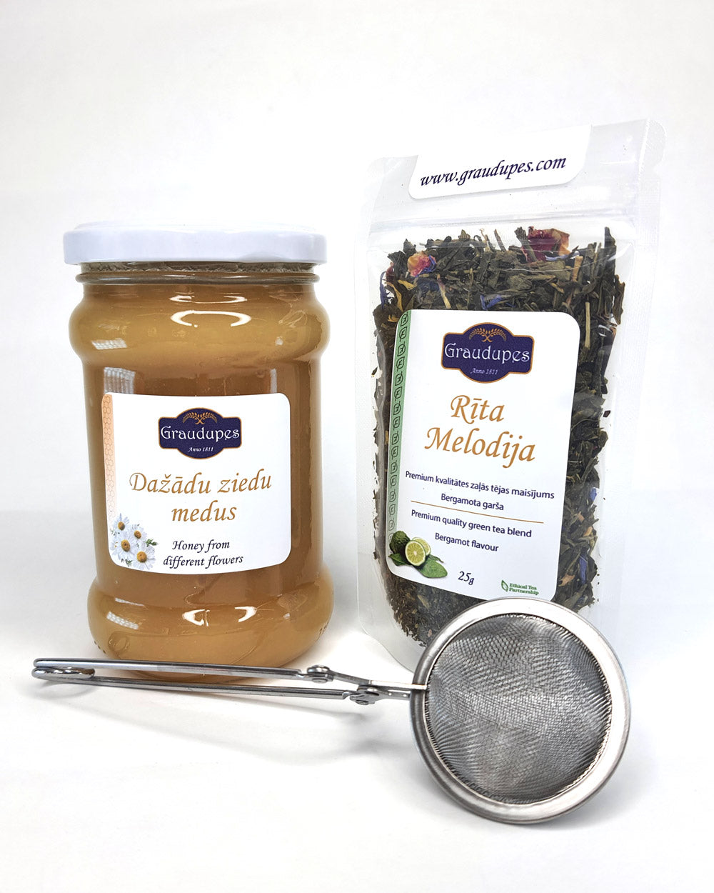The "Tea Gift Set with Honey" includes a 25g tea blend, a metal tea mesh strainer, and a 400g jar of honey Package