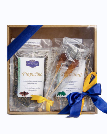 Tea Gift Set Enjoy"  featuring two 50g tea packets that the customer can select, two elegant sugar crystal sticks, and a premium tea mesh strainer Package | Graudupes