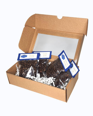 The "Coffee Gift Set Reveal" comprises four 30g coffee packets Graudupes