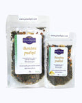 Packed tea two sizes large 50 grams and small 25 grams in transparent doypacks. Banana Pudding, Graudupes Whole Leaf Green Tea Blend, Sencha Loose Leaf Tea with dried Apple and Banana Pieces.