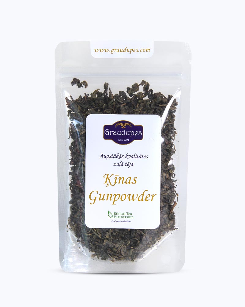 Packed tea in transparent doypack frontside. China Gunpowder Tea, Graudupes Classic Green Tea, Premium Loose Leaf Green Tea.