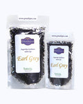 Packed tea two sizes large 50 grams and small 25 grams in transparent doypacks. Earl Grey tea, Graudupes Ceylon, Assam, and Bergamot Tea Blend, premium Loose Leaf Black Tea.