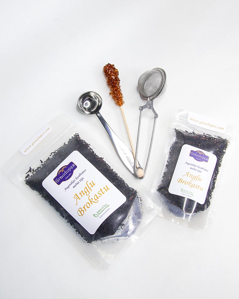 Packed tea with accessories: stainless steel tea mesh strainer, tea spoon measurement, sugar crystal stick.  Afternoon Tea, Graudupes Classic Darjeeling & Ceylon Tea Blend, premium loose leaf black tea.