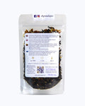 Packed tea in transparent doypack, back side. Mozart’s Symphony, Graudupes Whole Leaf Black Tea Blend, Assam loose leaf tea with Marzipan.