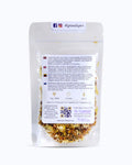 Packed tea in transparent doypack, back side. Pirates of the Caribbean, Graudupes Tropical Fruit Tea Blend, Tropical fruits, Loose leaf tea with tropical fruit pieces, Caramel & Tangerine Taste.