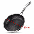 A stainless steel frying pan with a black honeycomb-textured non-stick interior, shown on a white background with a red diagonal measurement line and the text '20cm' indicating the pan's diameter.