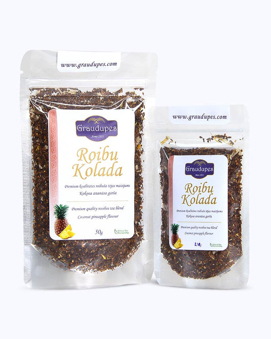 Packed tea two sizes large 50 grams and small 25 grams in transparent doypacks. Rooibo Colada, Graudupes Rooibos and Honeybush Tea Blend, Piña Colada Rooibos Mix, Loose leaf tea with coconut pieces and dried pineapple.